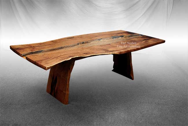 wood slab dining table showing bookmatched slabs and quilted maple center panel